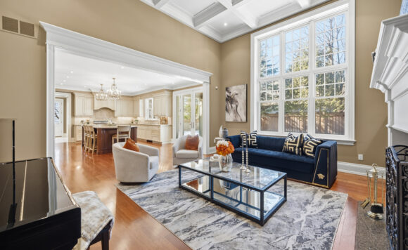 Family room with 13.5 ft waffled ceiling and custom millwork at 1049 Cedar Grove Boulevard in Morrison Oakville – Roberto Ficzere listing